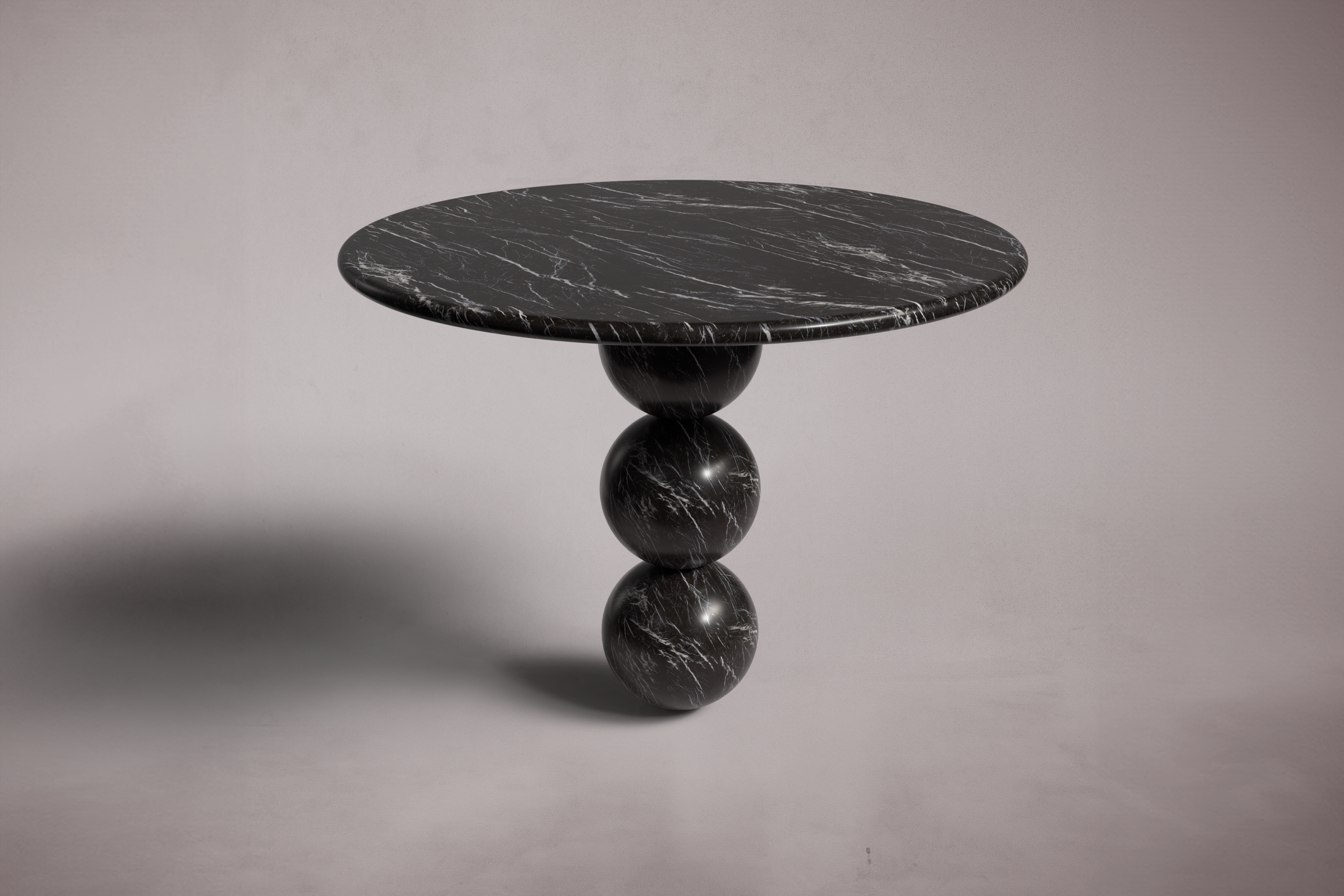 black marble round table. round black marble dining table. black marble entry table. black marble hallway table. custom marble dining table. custom marble table. custom black marble dining table.