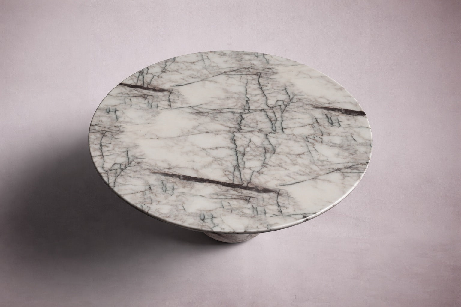 white marble dining table. white round marble dining table. round marble table. white marble table. custom round marble dining table. custom marble table. round marble dining table. round marble living room table.