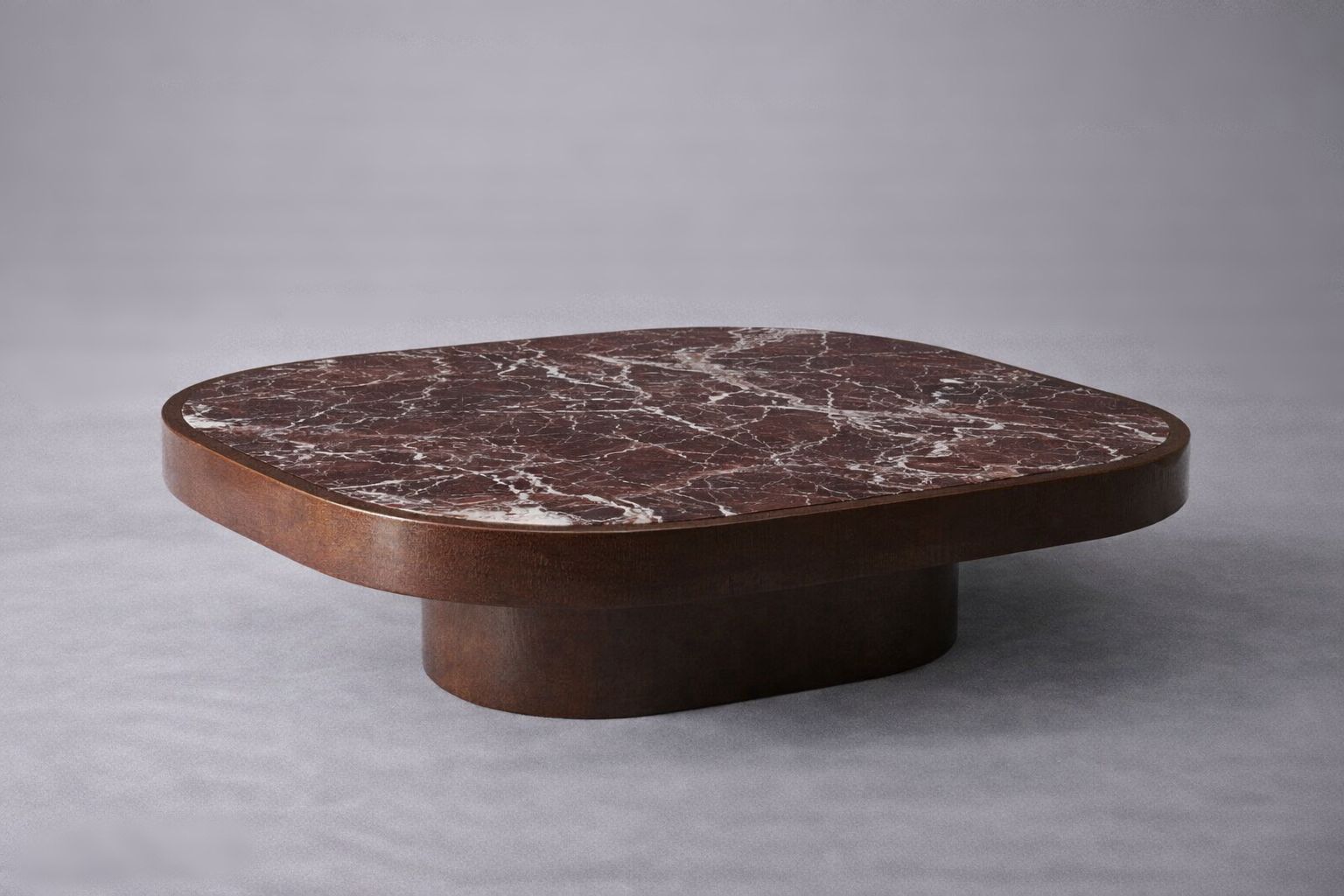 red marble coffee table. marble coffee table. red marble center table. oval red marble center table. custom marble coffee table. bespoke marble coffee table.