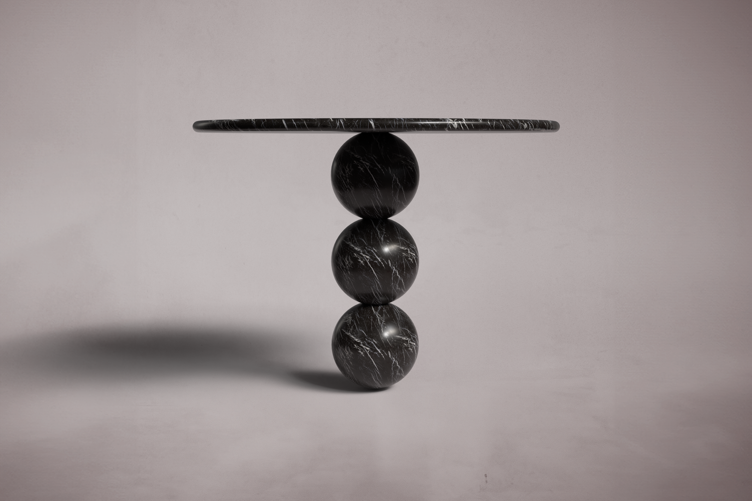 black marble round table. round black marble dining table. black marble entry table. black marble hallway table. custom marble dining table. custom marble table. custom black marble dining table.
