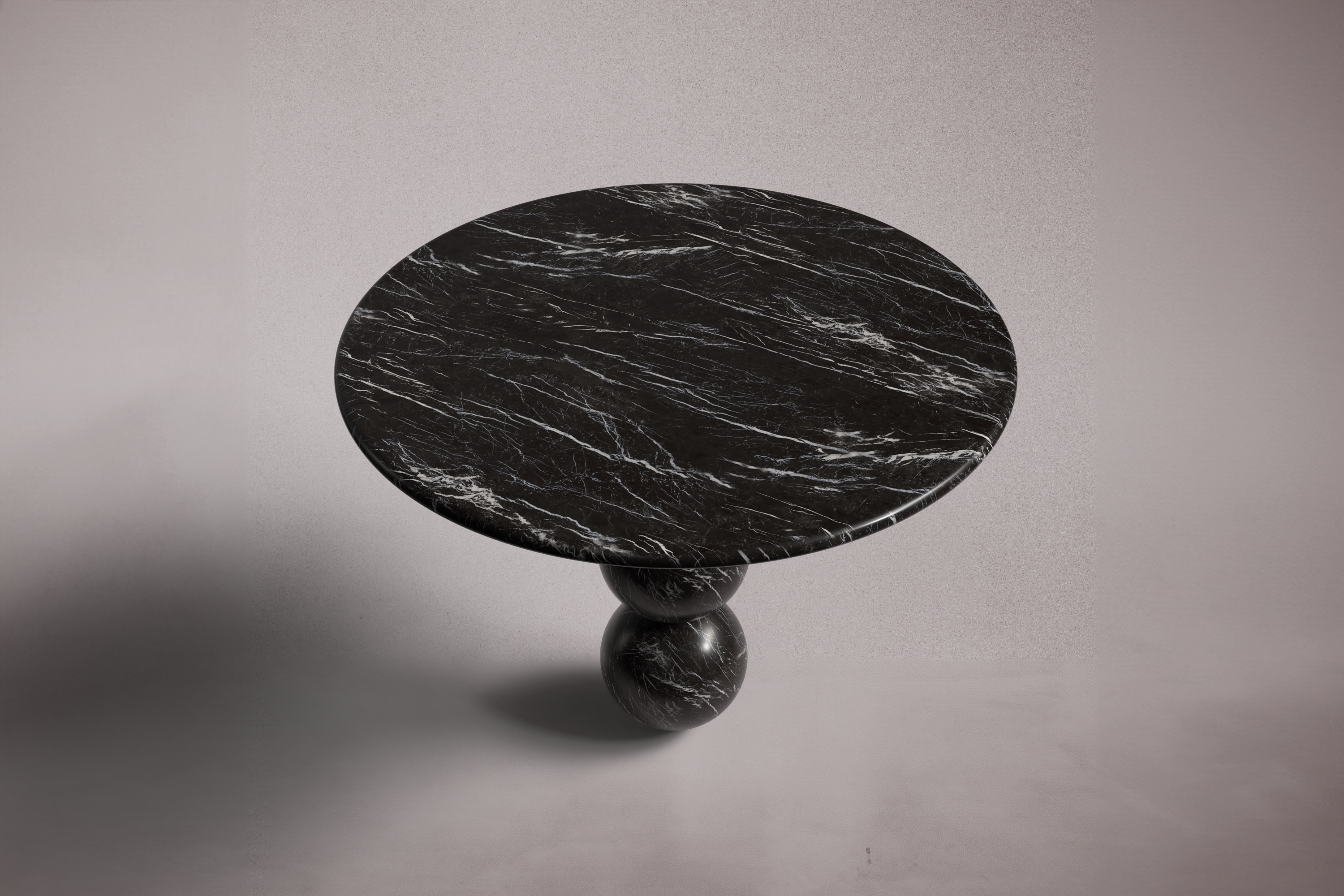 black marble round table. round black marble dining table. black marble entry table. black marble hallway table. custom marble dining table. custom marble table. custom black marble dining table.